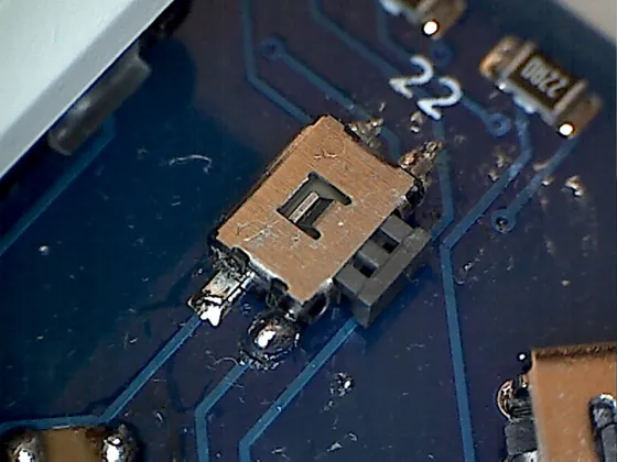 Close-up picture of the reset button (taken with USB microscope)